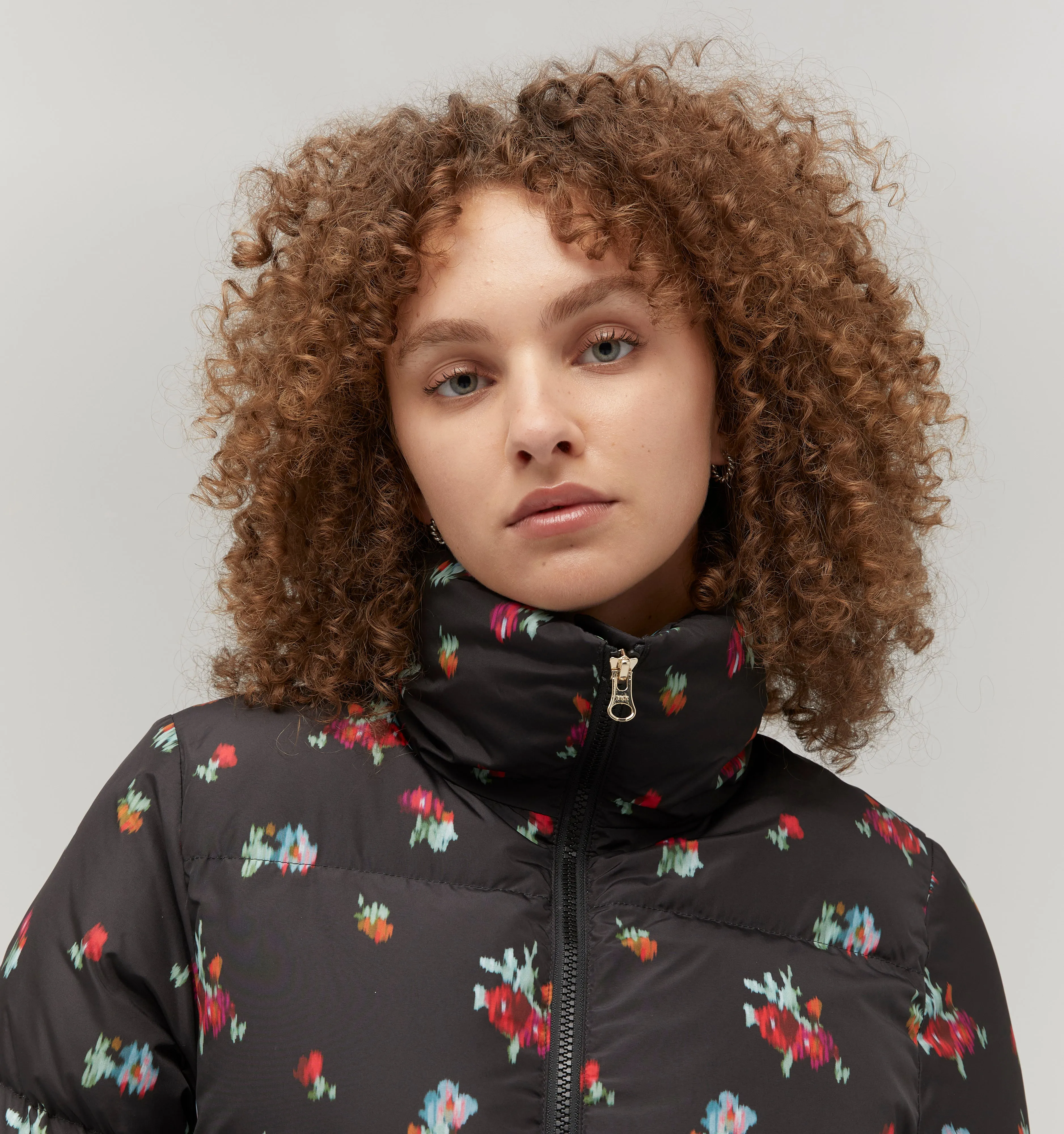 The Elara Puffer Jacket - Black Ikat Floral